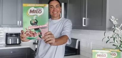 Mackenzie Arnold holding Milo cereal pack
